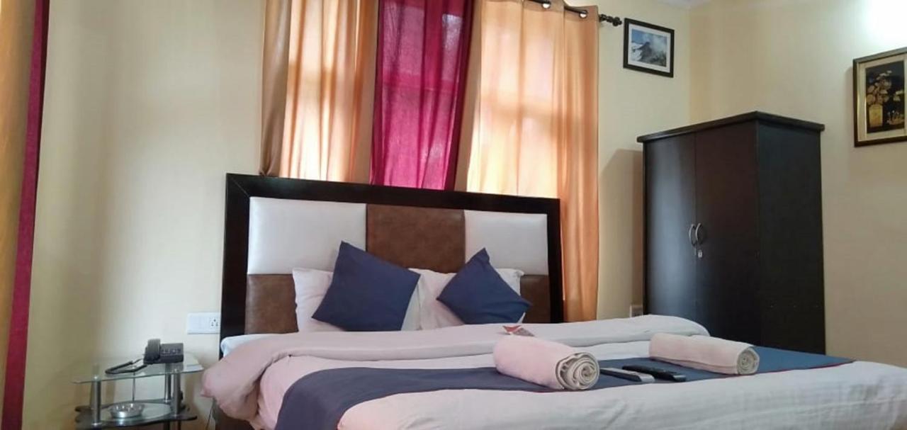 Hotel Om Palace McLeod Ganj Bagian luar foto